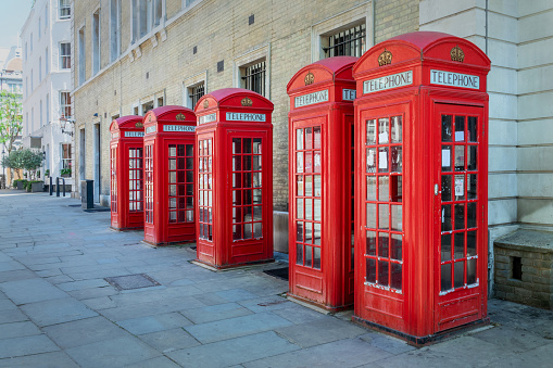 Obsolete run down telephone booth.