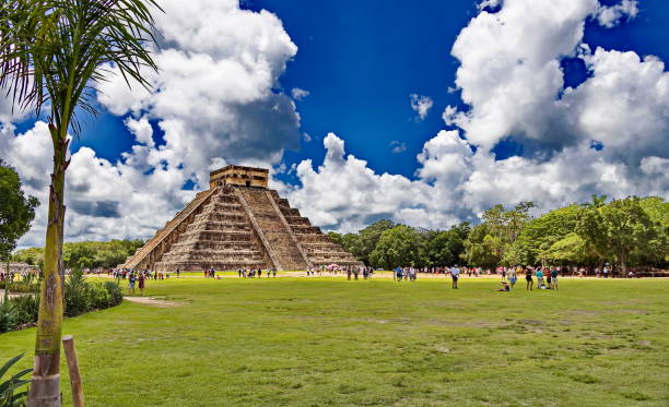 The Pyramid "El Castillo" (Temple of Kukulcán) dominates the center of the Chichen Itza archaeological site, Yucatan, Mexico stock photo