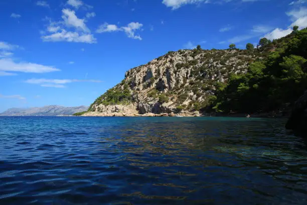 Clean Adriatic Sea and mountain peaks in Croatia
