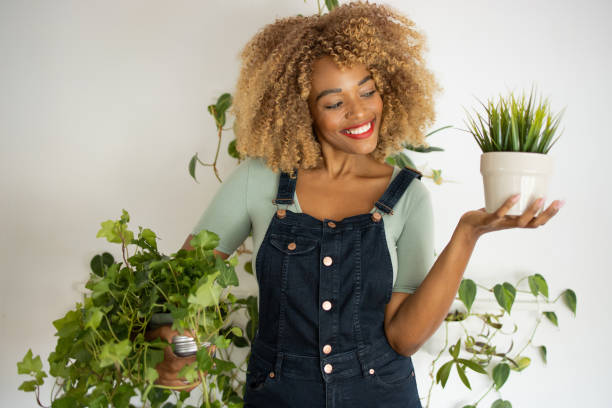 istock Woman enjoying with her plants at home 1419633231