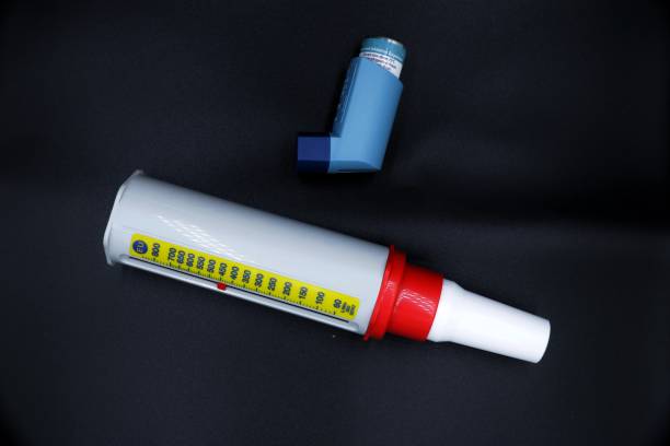 istock A peak flow meter with a inhaler medicine . 1419633359