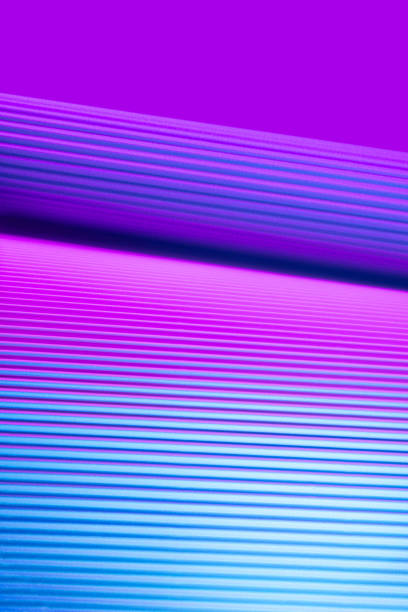 istock Violet and pink illuminated corrugated shapes. 1419633624