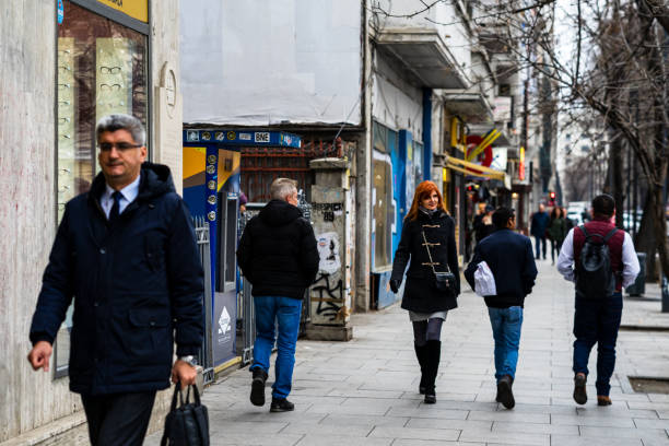 People and tourists wander the streets of the Bucharest Old Town, Romania, 2022 People and tourists wander the streets of the Bucharest Old Town, Romania, 2022 bucharest people stock pictures, royalty-free photos & images