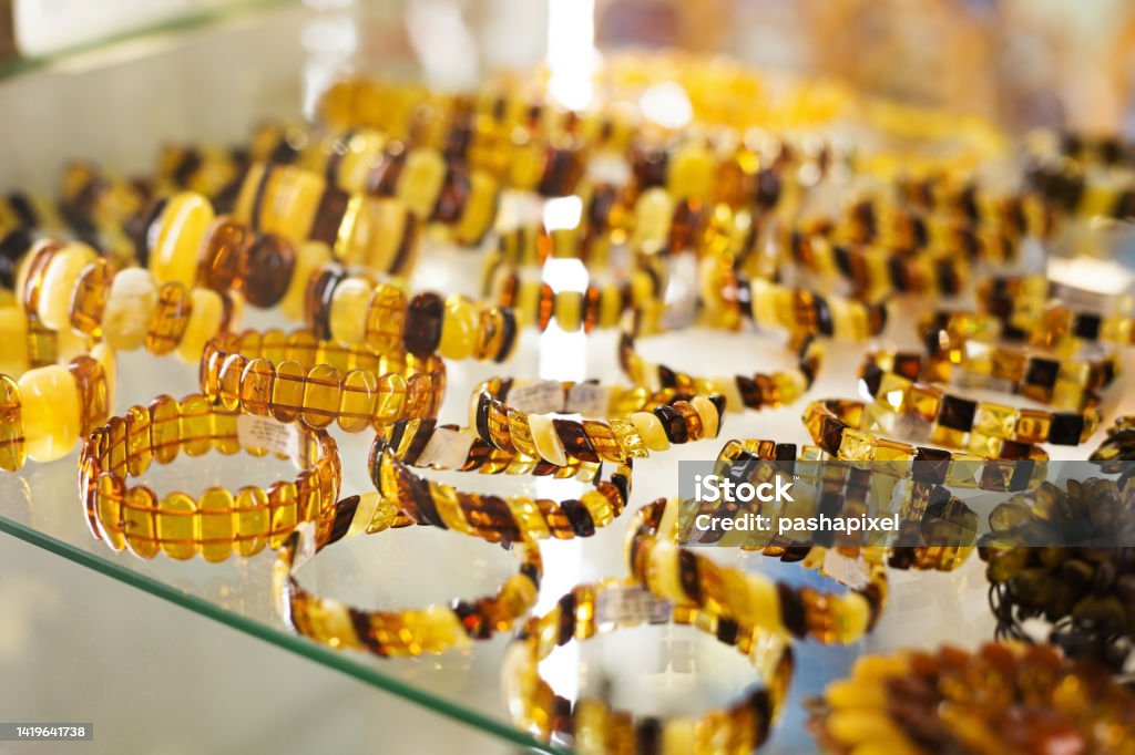 Natural amber jewelery from Kaliningrad Natural amber jewelery, traditional tourist souvenirs and gifts from Kaliningrad Amber Stock Photo