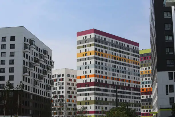 Photo of New buildings facades in housing complex