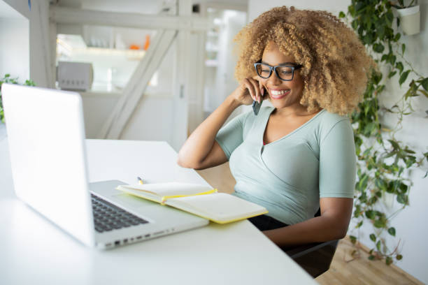 istock Young woman working from home 1419643736