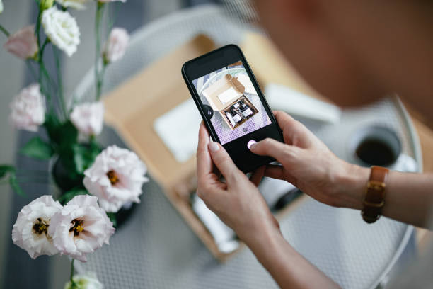 istock Anonymous Woman Taking a Photo of a Gift Box 1419645757