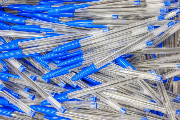 scattering of transparent ballpoint pens stock photo