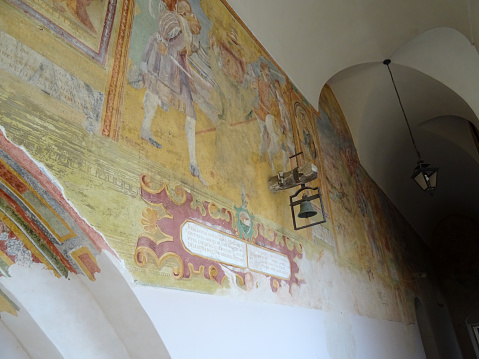Galatina, Province of Lecce, Apulia region, Italy - 22 August 2022: Basilica of Santa Caterina d'Alessandria - Frescoes in the cloister