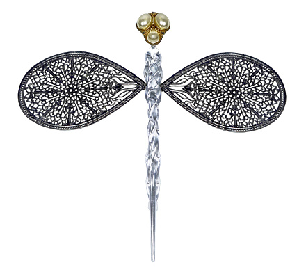 Dragonfly created out of different objects in antique silver and gold and transparent materials-isolated on white  background
