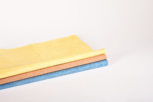 Group of colorful cleaning cloths on the white background