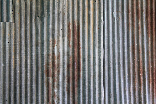 Old galvanized surface rusted and welded texture background