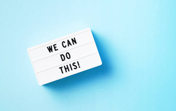 istock We Can Do This Written White Lightbox Sitting On Blue Background 1419679627