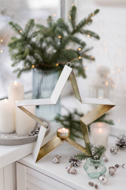 istock Bouquet of spruce and burning candles 1419684450