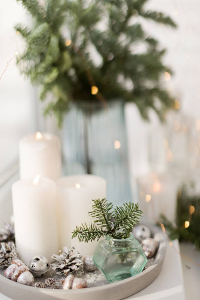 istock Bouquet of spruce and burning candles 1419684463