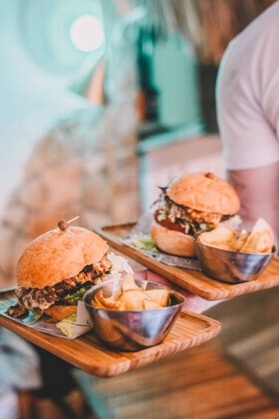 istock two cheeseburgers and fries 1419685629