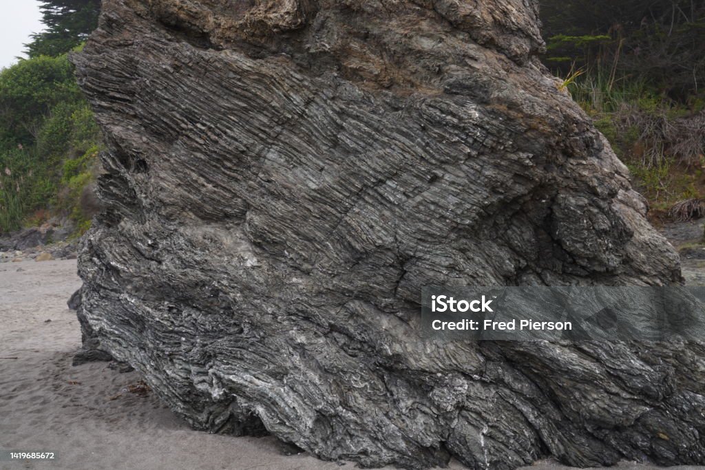 Prodelta Striated Rock Striated rock formation on the North Pacific coast near Trinidad California Rock - Object Stock Photo