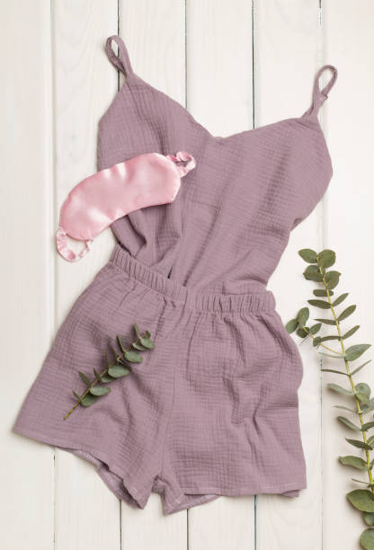 istock Flat lay composition with beautiful pajamas on wooden background, top view 1419695976