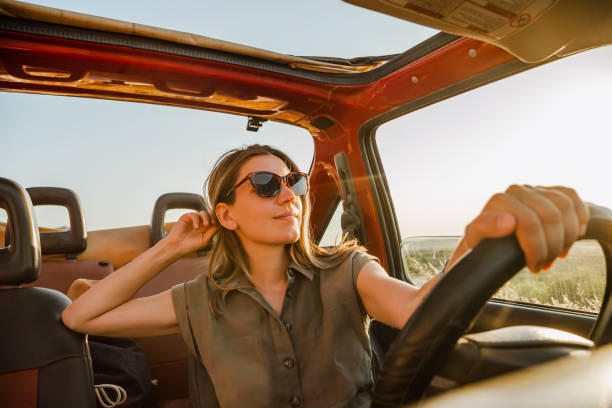 istock Young woman on a road trip 1419699306