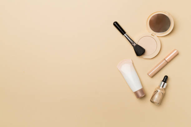 istock Makeup products for skin tone on color background, top view 1419701278