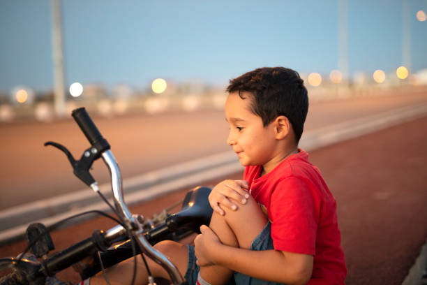 A boy who has been in a bicycle accident