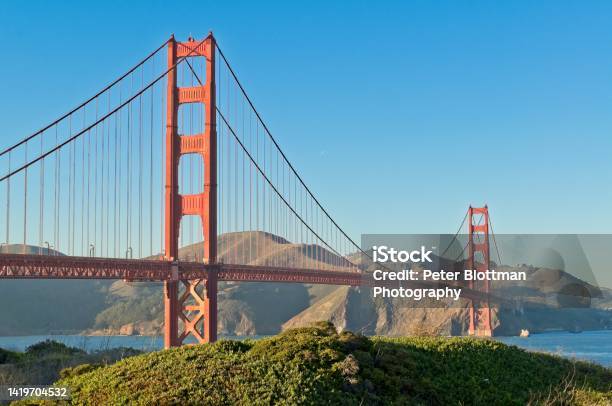The Very Recognizable And Iconic Golden Gate Bridge In Afternoon Warm Light Stock Photo - Download Image Now