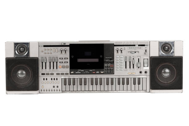 Retro vintage portable stereo cassette recorder from 80s isolated on white background.
