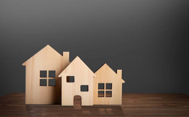 istock Toy house, on wooden floor 1419711279