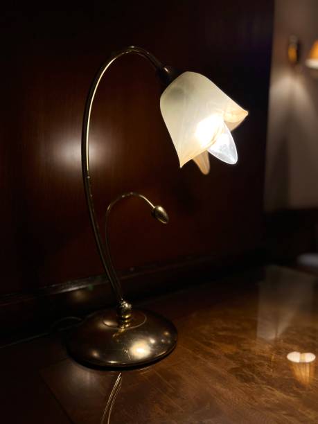 istock Vintage Golden Desk Lamp with Warm Light 1419712665