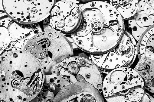Broken movement of an old pocket watches background