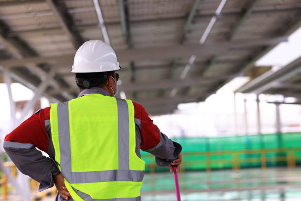 istock solar cell technician working for Solar cell installation , Renew or Reusable energy concept 1419720454