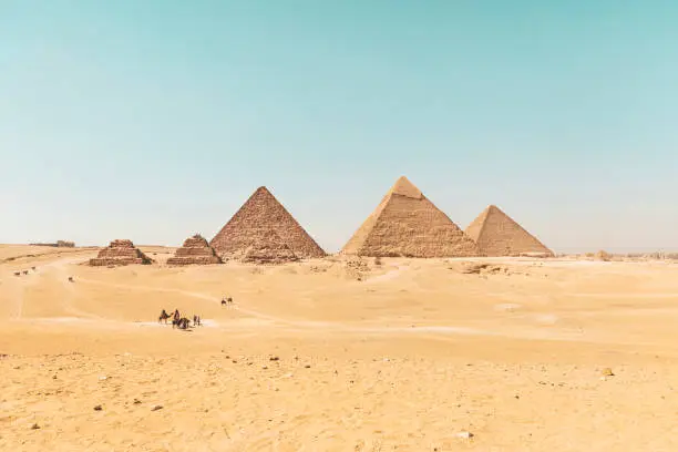 Archaeological complex of the Great Egyptian Pyramids is located on the Giza plateau. Pyramids of Chephren Khafra and Cheops Khufu and Mikerina Menkaura. Cairo, Egypt.
