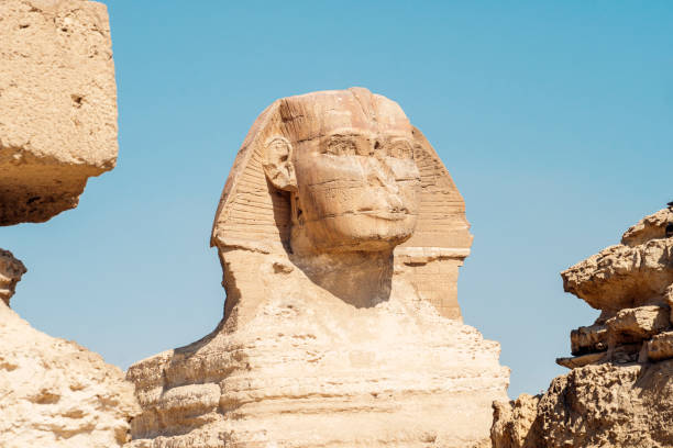 istock The great ancient Sphinx on a blue background. iconic Sphinx carving adjacent to the Great Pyramids at Giza, Egypt 1419731455
