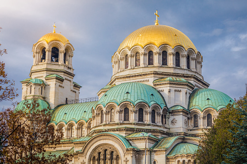 A stunning shot of the Alexander Nevsky Cathedral, one of Sofia's most iconic landmarks, displaying its neo-Byzantine architecture, golden domes, and intricate details, standing as a testament to Bulgaria's rich history and religious heritage.