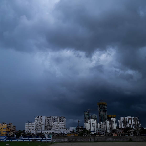 istock dark sky and heavy rain thunder storm over a city. 1419733957