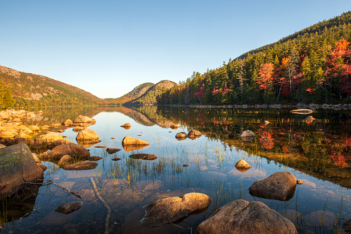 A lake landscape with colorful fall foliage.