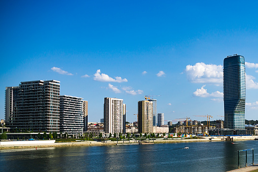 Modern city with office buildings by the river