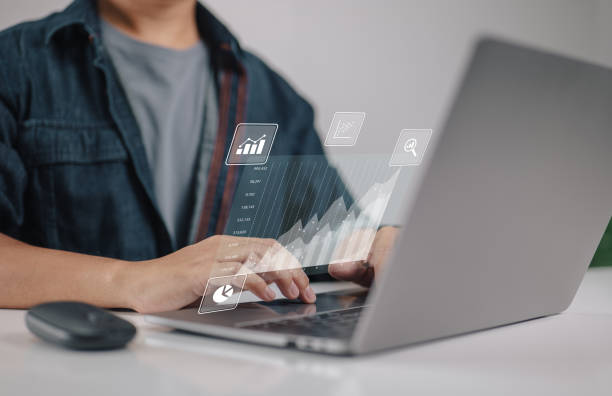 istock Big data analytics and business intelligence concepts. Financial charts are displayed on an computer display. 1419747437