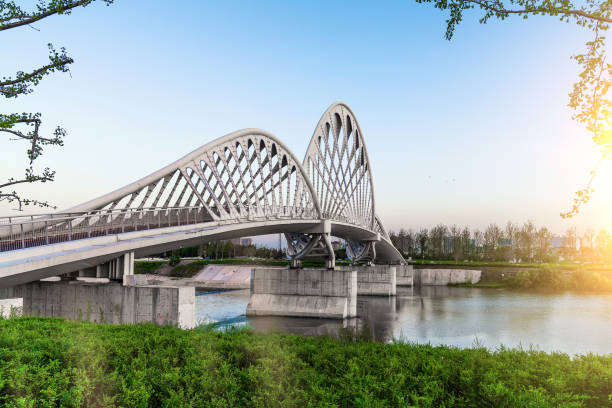 istock pedestrian bridge in the park 1419759217