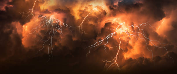 istock Dark cloud at evening sky with thunder bolt. Heavy storm bringing thunder, lightnings and rain in summer. 1419759629