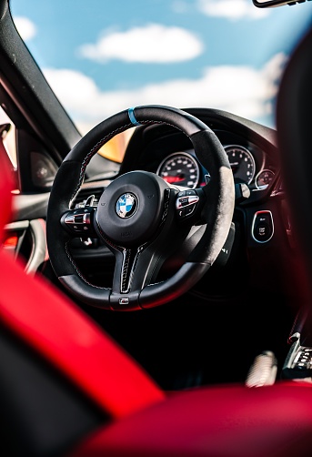 Seattle, WA, USA
August 5, 2022
White BMW M4 showing the interior and steering wheel