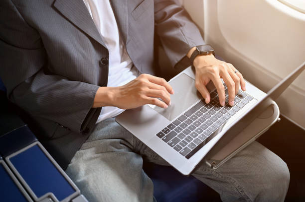 Free Stock Photo of A businessman is working with laptop computer in ...