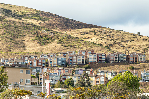 San Francisco, USA - June 5, 2022: new houses at the hill at the city border of San Francisco for families with children.