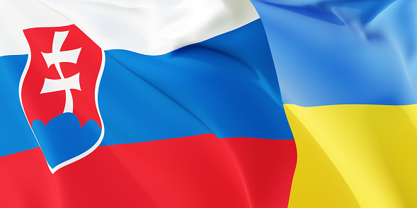 Slovakian and Ukrainian flags flying in the wind. Slovakia stand with Ukraine. 3D rendered image.