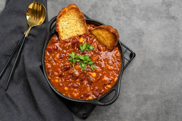 istock Bean and corn soup or ragout, red bean stew on a wooden background. 1419784256