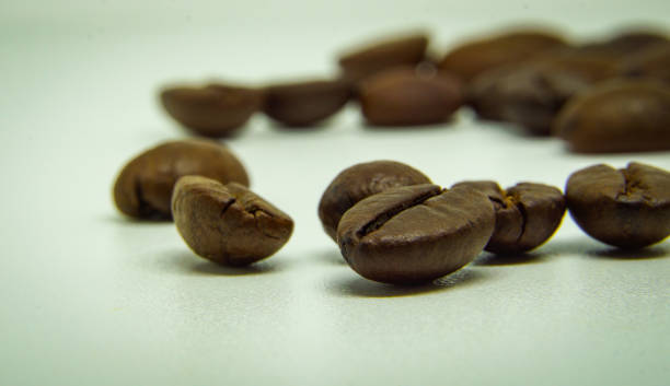 istock The way coffee beans lay on a white background. 1419788420