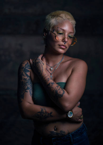 istock Latinx girl with tattoos 1419790679