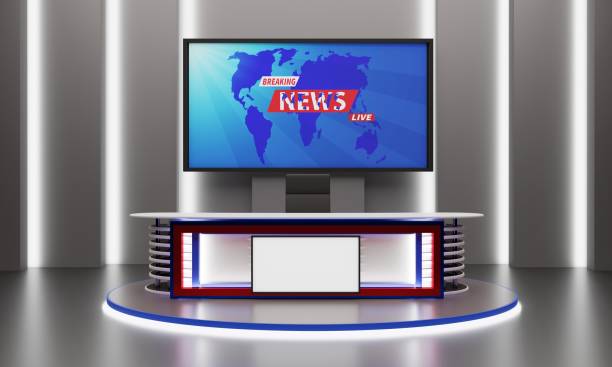 istock white table on stand with led screen background in the red news studio room.3d rendering. 1419791256