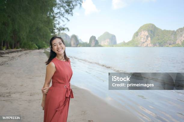 Young Asian Tourism Adult Tourist Women Relaxing At Ao Nang Beach Ko Phi Phi Don Island Krabi Province Thailand Stock Photo - Download Image Now