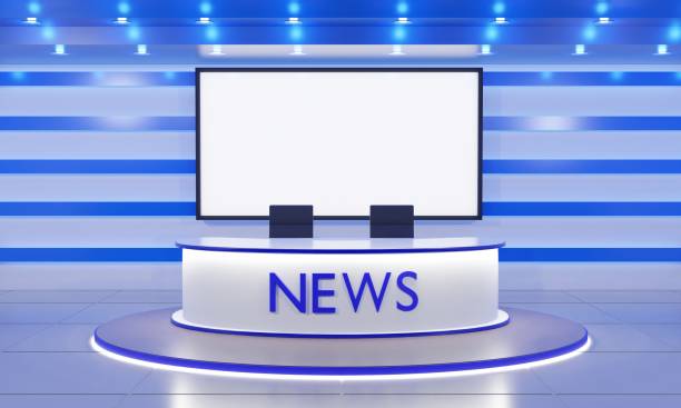 istock white table on stand with led screen background in the red news studio room.3d rendering. 1419792586